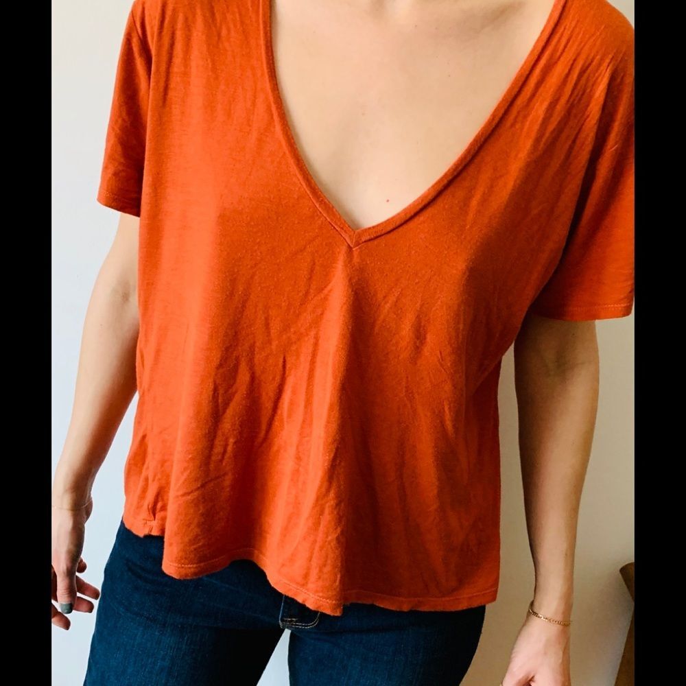 Flynn Skye brick/burnt orange color short-sleeved deep v-neck top, size Small